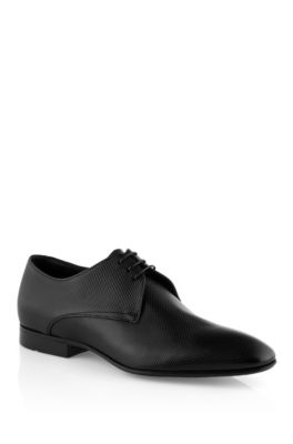 Ankle boots en cuir de vachette grav&eacute;, Topik