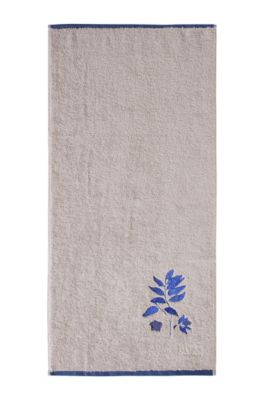 Handdoek &acute;COBALT LEAVES` met bloemenmotief