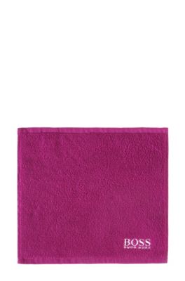 Waslapje &acute;PLAIN` met contrastkleurig logostiksel